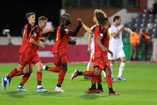 Romelu Lukaku of Belgium scores a penalty and celebrates