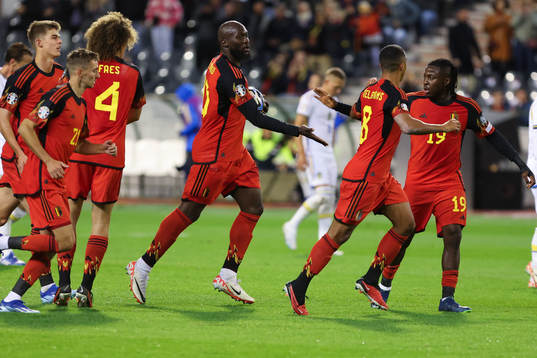 Romelu Lukaku of Belgium scores a penalty and celebrates
