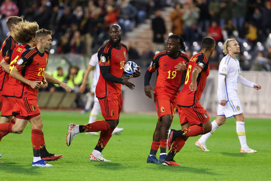 Romelu Lukaku of Belgium scores a penalty and celebrates