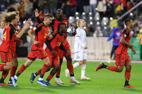 Romelu Lukaku of Belgium scores a penalty and celebrates