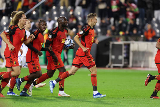 Romelu Lukaku of Belgium scores a penalty and celebrates