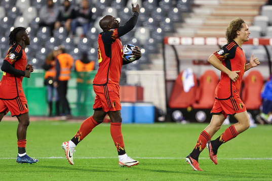 Romelu Lukaku of Belgium scores a penalty and celebrates