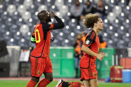 Romelu Lukaku of Belgium scores a penalty and celebrates