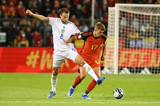 Albin Ekdal of Sweden battles for the ball with Charles De