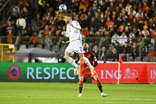 Linus Wahlqvist of Sweden battles for the ball with Yannick