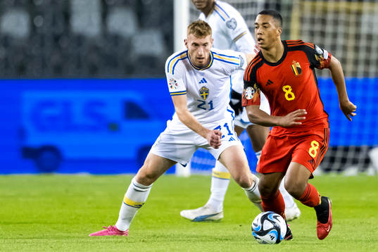Dejan Kulusevski of Sweden and Youri Tielemans of Belgium