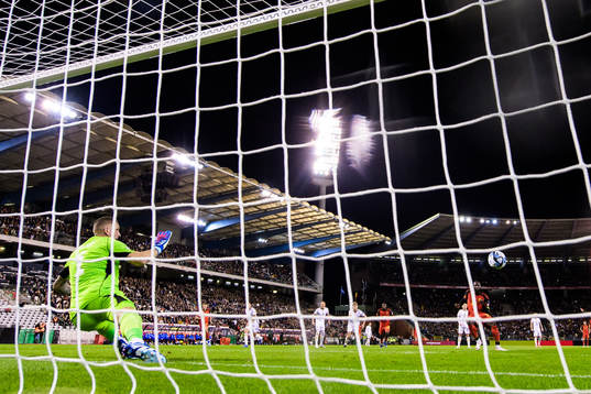 Goalkeeper Robin Olsen of Sweden lets in the 1-1- goal