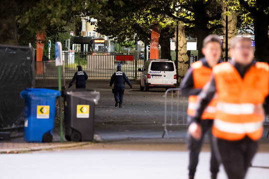Police outside of the King Baudouin Stadium and running