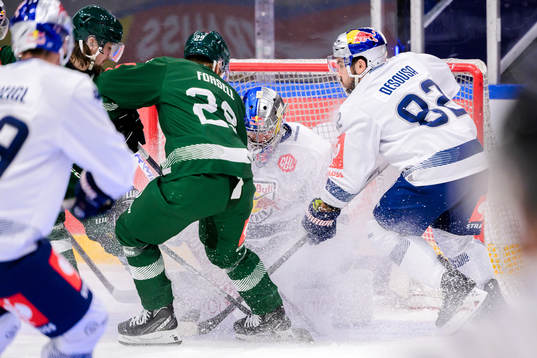 Lucas Forsell of Färjestad and goaltender Daniel Allavena