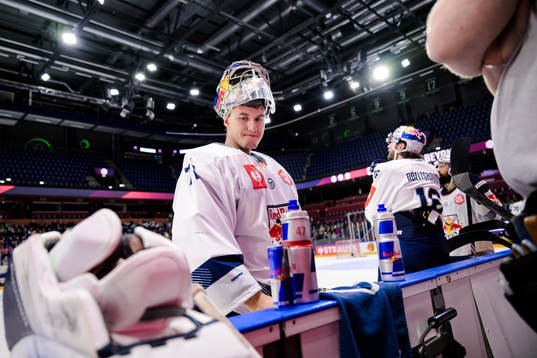 Goaltender Daniel Allavena of Munich looks dejected