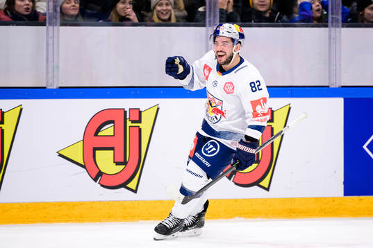 Chris Desousa of Munich celebrates