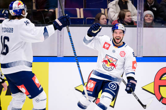 Chris Desousa of Munich celebrates