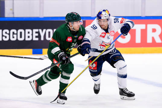 Michael Lindqvist of Färjestad and Ryan McKiernan of Munich