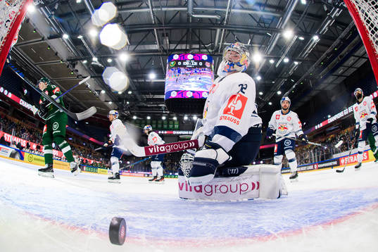 goaltender Daniel Allavena of Munich looks dejected