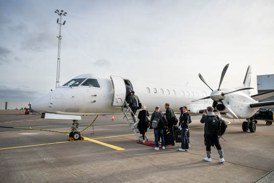Club manager Marcus Jodin of Häcken and staff boarding a