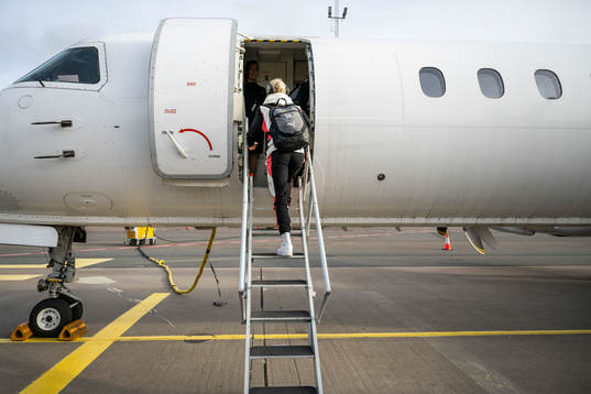 Anna Sandberg of Häcken boards a plane at Landvetter
