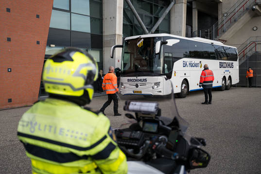 Police watch as the team bus of Häcken arrive