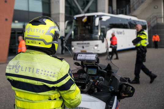 Police watch as the team bus of Häcken arrive