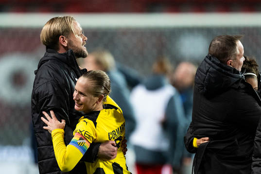 CEO MArcus Jodin and Filippa Curmark of Häcken celebrate