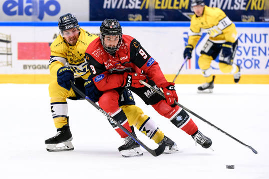 HV71s Mikael Seppälä och Malmö Redhawks Alan Quine