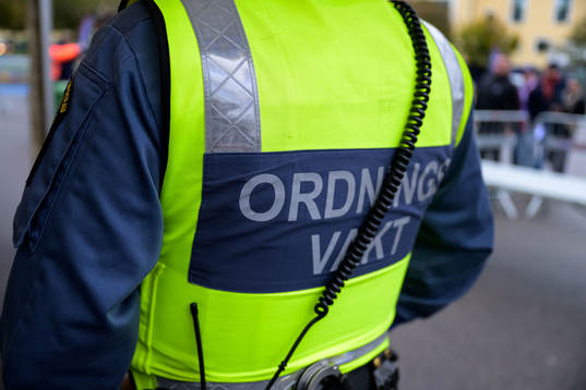 Ordningvakt vid insläppet på Olympia