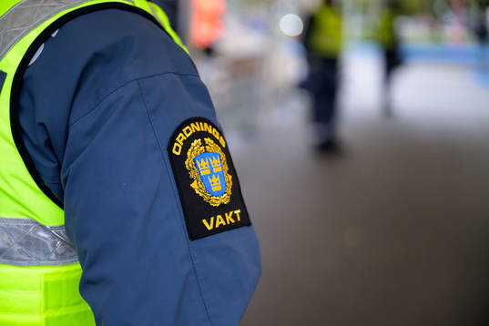 Ordningvakt vid insläppet på Olympia