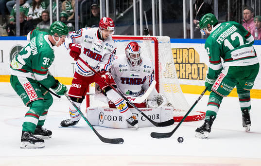 Rögle BKs Oskar Pettersson och Brady Ferguson och Timrå
