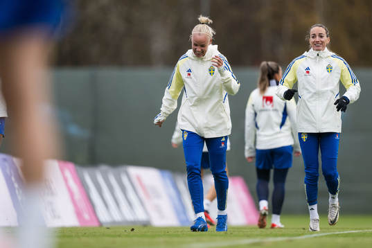 Kosovare Asllani of Sweden Caroline Seger