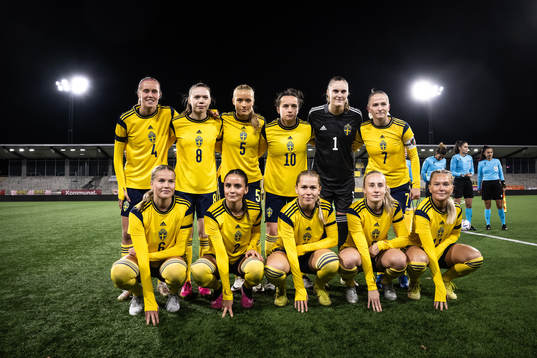 Players of Sweden pose for a team group photo