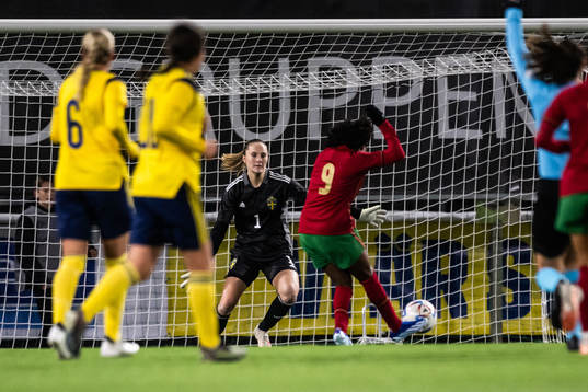 Goalkeeper Julia Cavander of Sweden and Leonete Correia of
