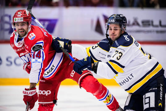 Timrås Emil Pettersson och HV71s Nicholas Shore