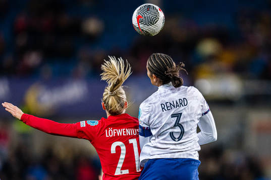 Mimmi Löfwenius of Norway and Wendie Renard of France