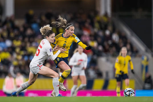 Luana Buhler of Switzerland and Kosovare Asllani of