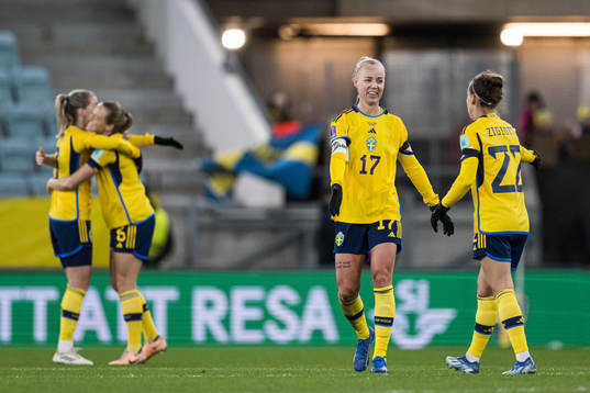 Caroline Seger and Julia Zigiotti Olme of Sweden celebrate