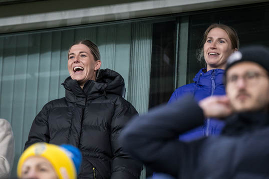 Olivia Schough and Emma Berglund in the stands