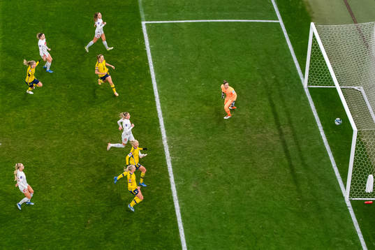 Magdalena Eriksson of Sweden scores 1-0 behind goalkeeper