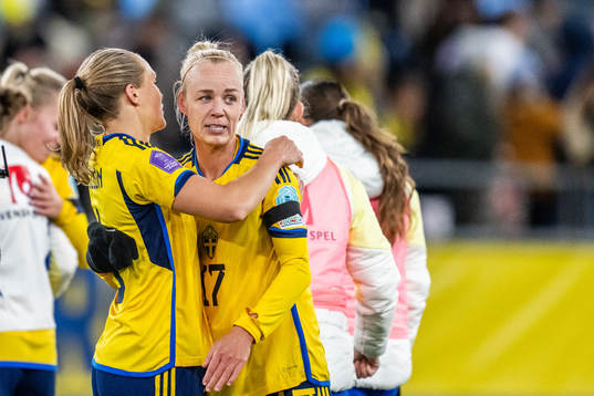 Magdalena Eriksson and Caroline Seger of Sweden celebrate