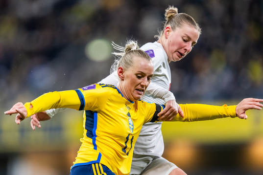 Stina Blackstenius of Sweden and Julia Stierli of