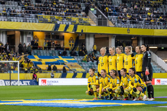 The starting eleven of Sweden pose for a team group photo