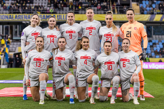 The players of Switzerland pose for a photo