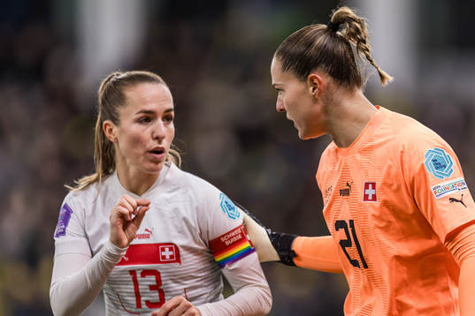 Lia Wälti and goalkeeper Elvira Herzog of Switzerland