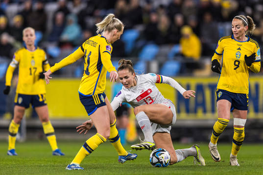 Stina Blackstenius and Kosovare Asllani of Sweden and Lia