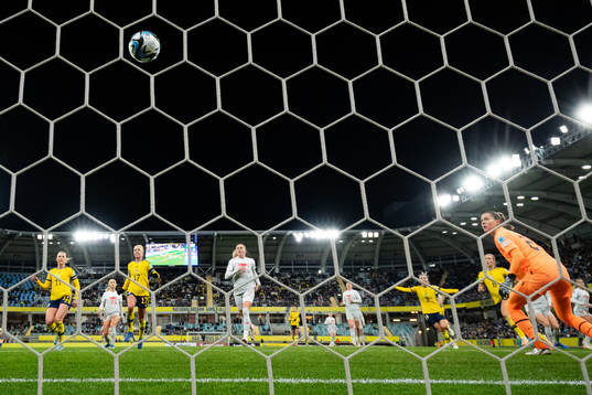 Magdalena Eriksson of Sweden scores 1-0 behind goalkeeper