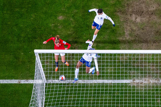 Marit Bratberg Lund of Norway scores the 1-1 goal past