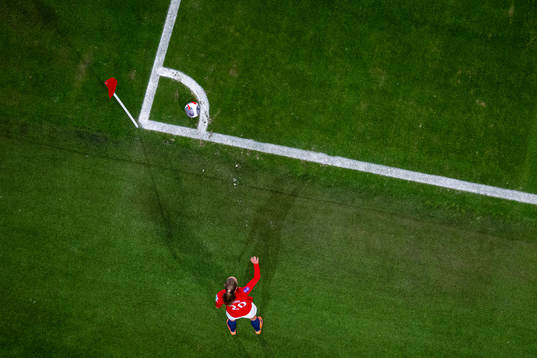 Marit Bratberg Lund of Norway takes a corner kick
