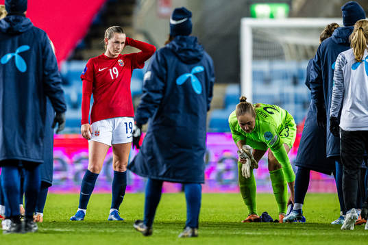 Elisabeth Terland and goalkeeper Aurora Mikalsen of Norway