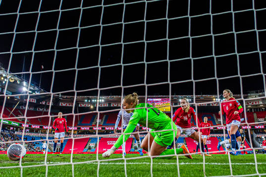 Maren Mjelde of Norway scores an own goal