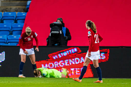 goalkeeper Aurora Mikalsen of Norway in pain