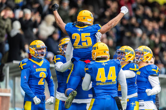 Oliver Lundberg of Sweden celebrates with team mates