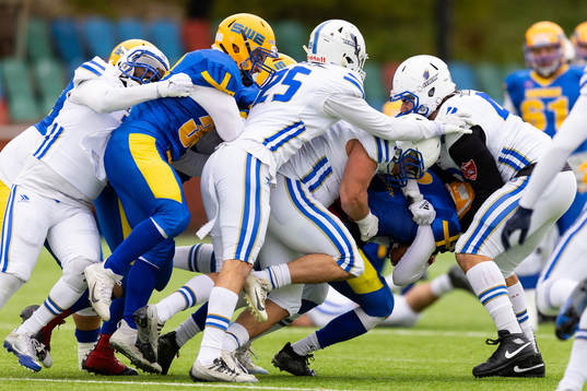 Players of Sweden and of Italy battles for the ball